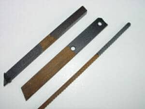 Rusty metal blades partially treated with Ferrocon